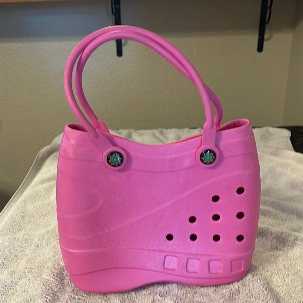 Glossy Pink Bucket Bag with Integrated Handles